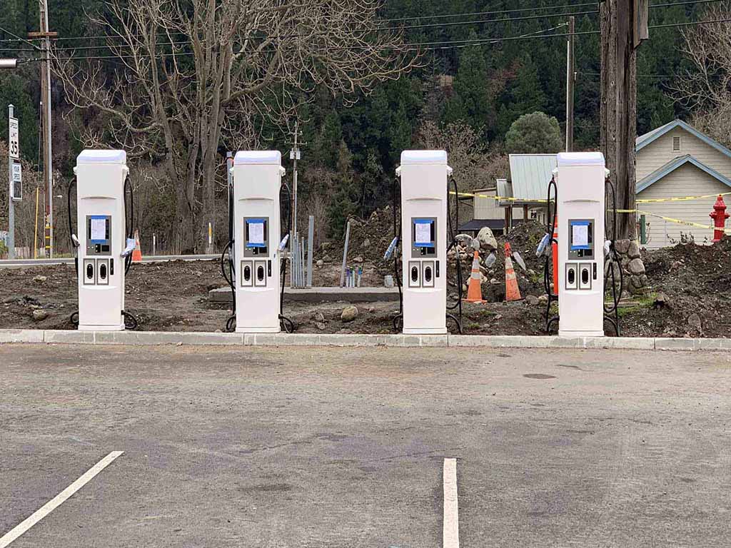 Four DCFC chargers in parking lot in the Hoopa Valley